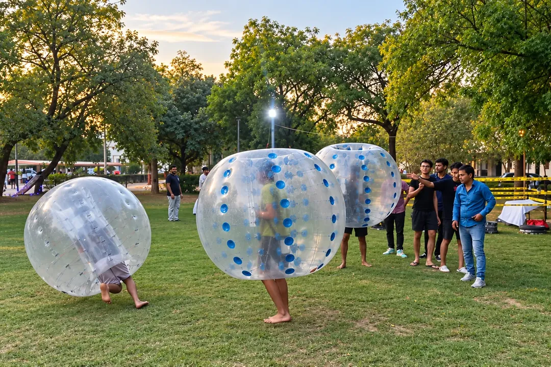 Guests in zorbing bubbles playing on a lawn