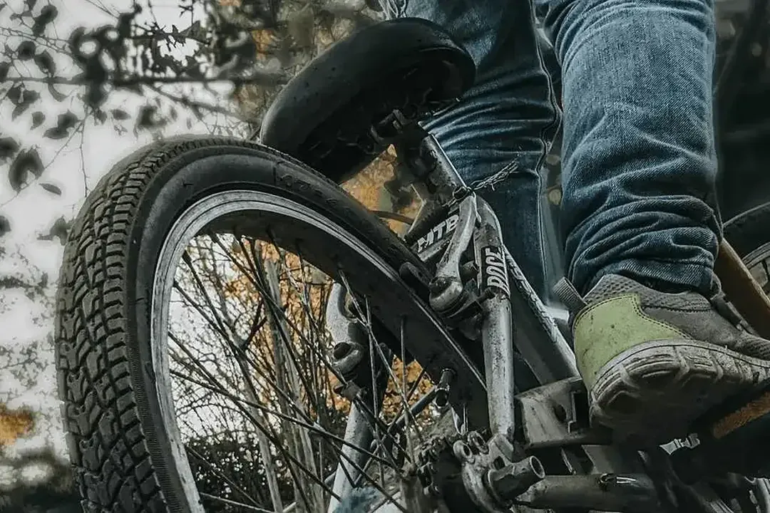 Close-up of a rider pedalling a bicycle