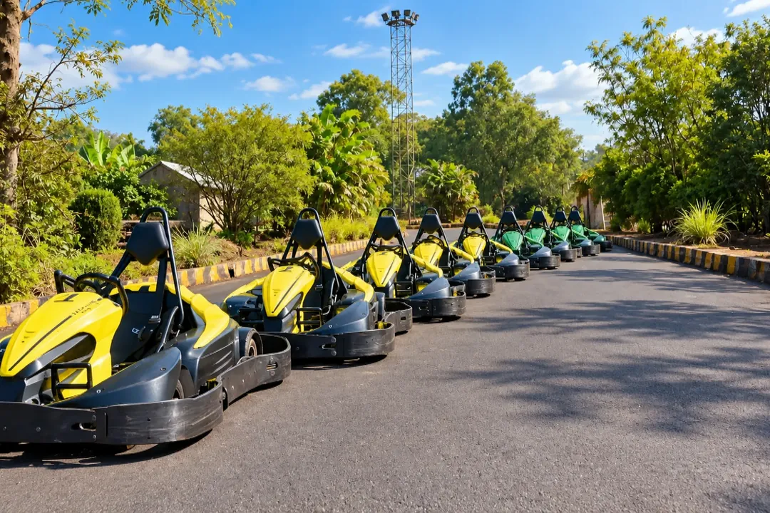 Row of yellow go-karts lined up on a track